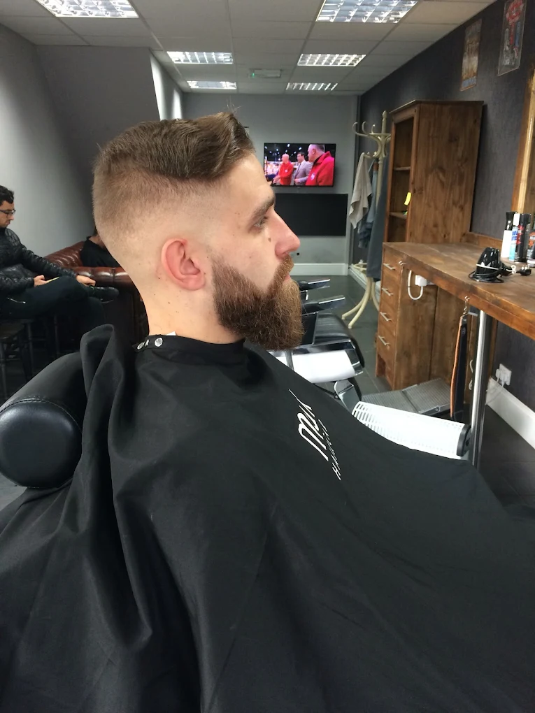 Recent mid fade and styled top from The Gentlemen's Barber Coventry