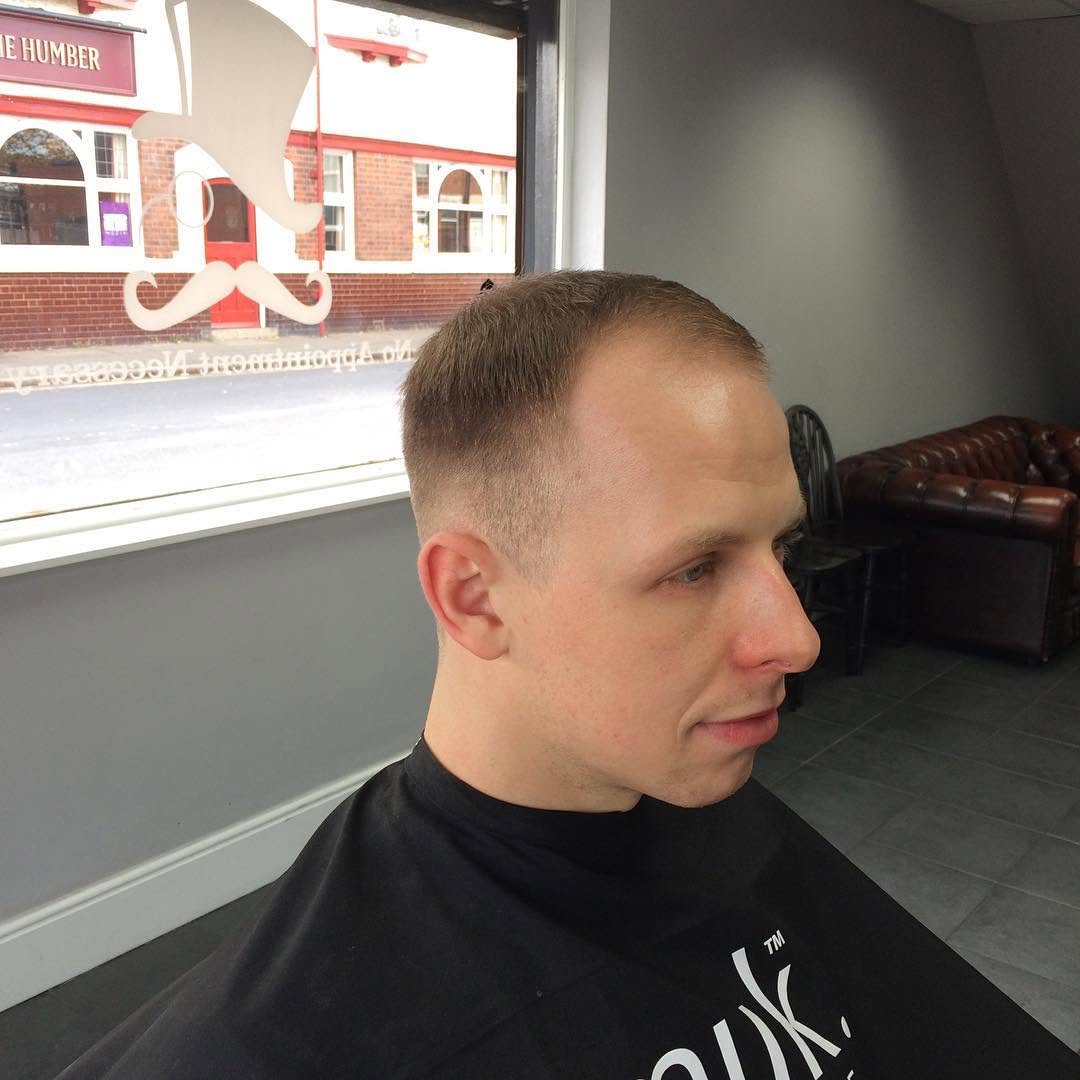 Recent tidy haircut and neckline finish